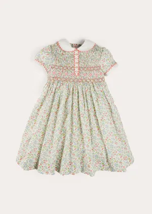 Cordelia Floral Hand-Smocked Short Sleeve Dress in Pink Made with Liberty Fabric (12m-6yrs) Cordelia Floral Hand-Smocked Short Sleeve Dress in Pink Made with Liberty Fabric (12m-6yrs)